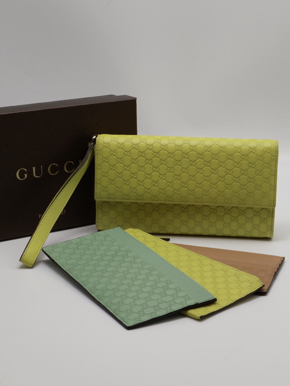GUCCI 雙G壓紋四合一手拿包
