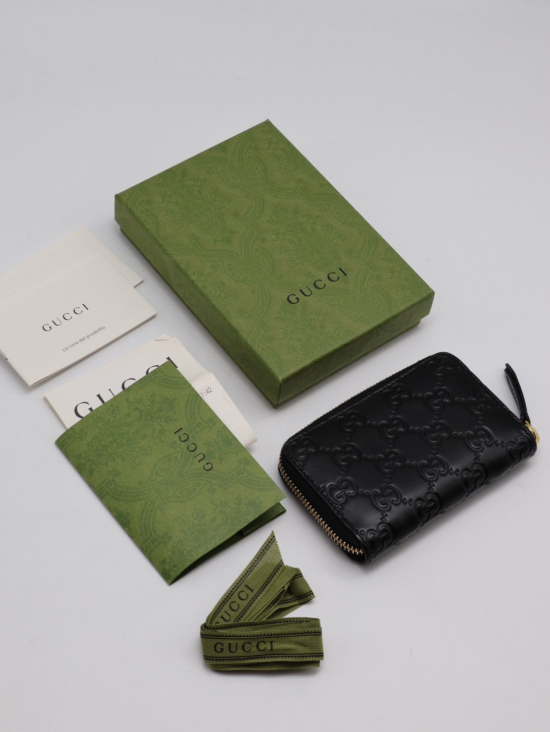 GUCCI 壓紋老花拉鍊卡包 - 黑