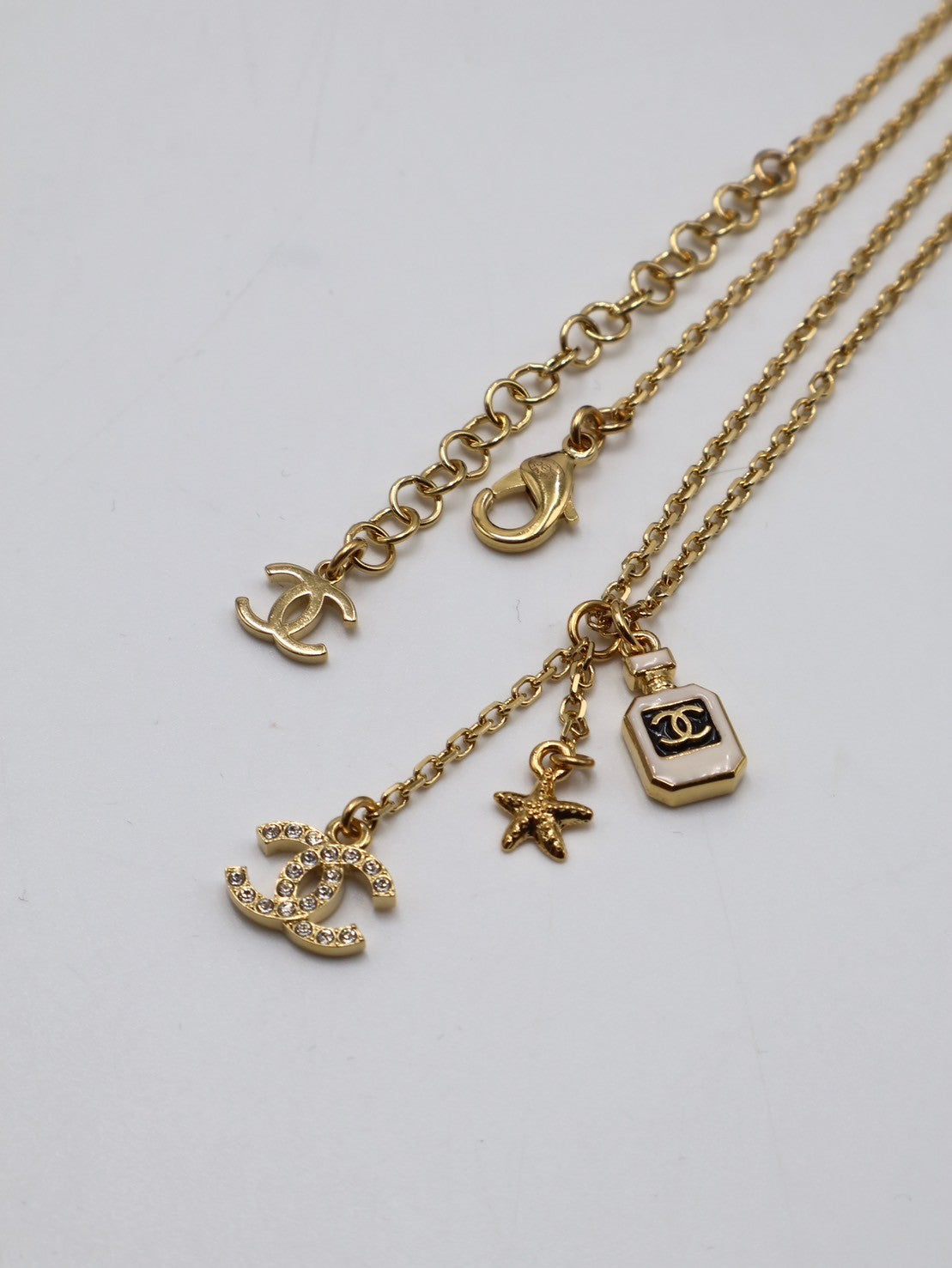 CHANEL 23S香水瓶海星雙C吊墜項鍊