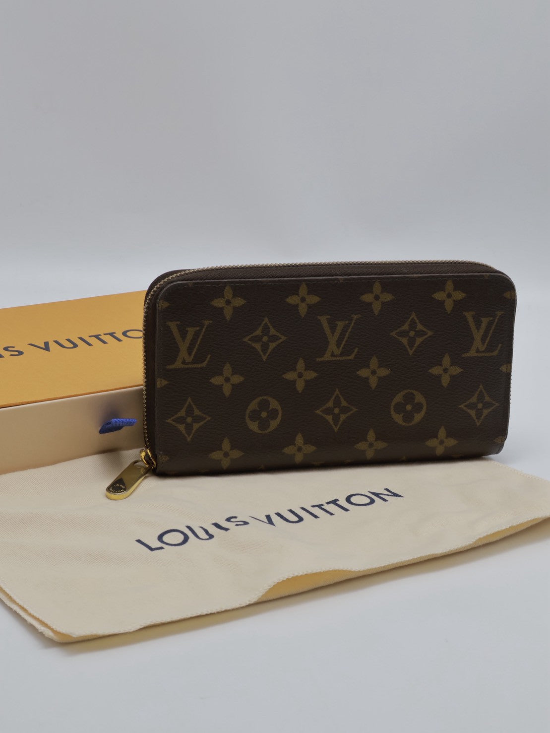 LOUIS VUITTON 經典老花拉鍊長夾 - 棕