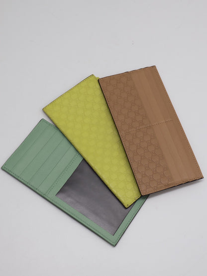GUCCI 雙G壓紋四合一手拿包