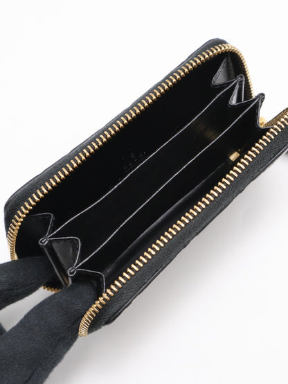 GUCCI 壓紋老花拉鍊卡包 - 黑