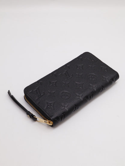 LOUIS VUITTON 壓紋牛皮拉鍊長夾 - 黑