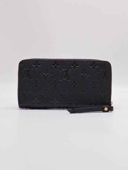 LOUIS VUITTON 壓紋牛皮拉鍊長夾 - 黑