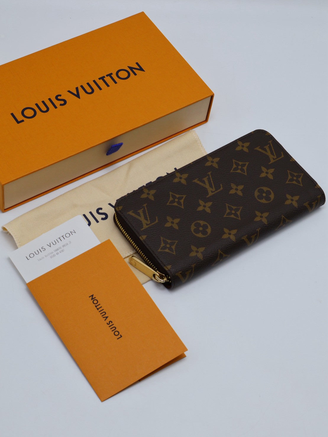 LOUIS VUITTON 經典老花拉鍊長夾 - 棕
